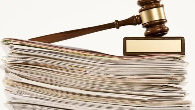 Gavel, documents, papers, litigation case