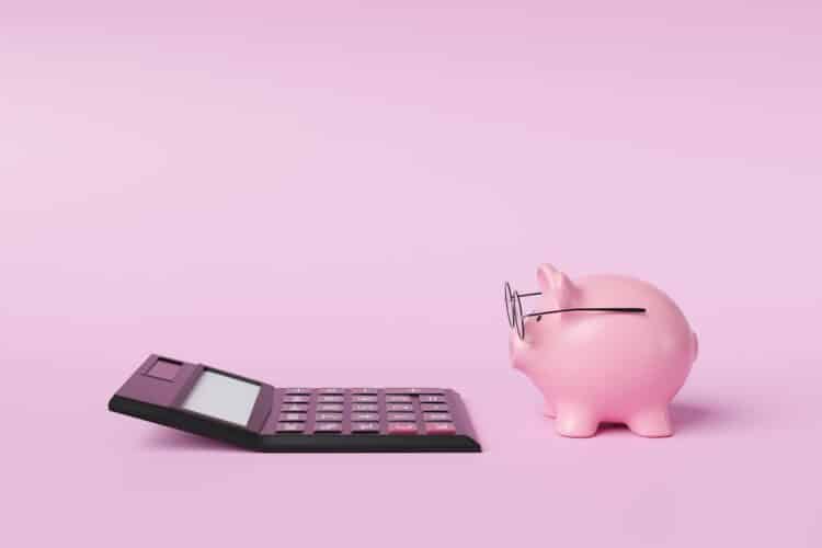 Piggy bank wearing glasses looking at calculator, SMSF pension breaches